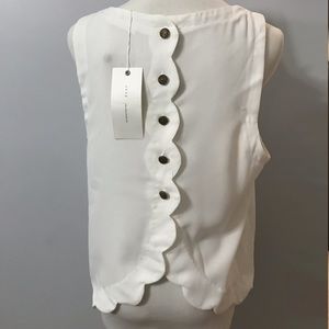 White top with scallop edge